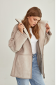 Women's sheepskin coat of beige color made of natural sheepskin