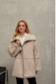 Women's sheepskin coat of beige color made of natural sheepskin