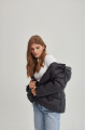 Women's short black down jacket with a hood and natural filling