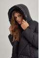 Women's short black down jacket with a hood and natural filling