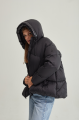 Women's short black down jacket with a hood and natural filling