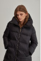 Women's long black down jacket with a hood and natural filling