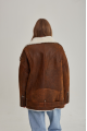 Women's sheepskin coat in a vintage style, made of natural sheepskin in the color of whiskey