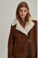 Women's sheepskin coat in a vintage style, made of natural sheepskin in the color of whiskey