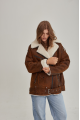 Women's sheepskin coat in a vintage style, made of natural sheepskin in the color of whiskey