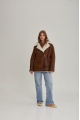 Women's sheepskin coat in a vintage style, made of natural sheepskin in the color of whiskey