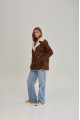 Women's sheepskin coat in a vintage style, made of natural sheepskin in the color of whiskey