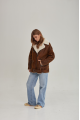 Women's sheepskin coat in a vintage style, made of natural sheepskin in the color of whiskey