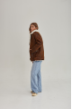 Women's sheepskin coat in a vintage style, made of natural sheepskin in the color of whiskey