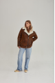 Women's sheepskin coat in a vintage style, made of natural sheepskin in the color of whiskey