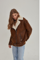 Women's sheepskin coat in a vintage style, made of natural sheepskin in the color of whiskey