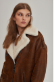 Women's sheepskin coat in a vintage style, made of natural sheepskin in the color of whiskey