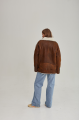 Women's sheepskin coat in a vintage style, made of natural sheepskin in the color of whiskey