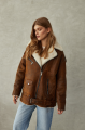 Women's sheepskin coat in a vintage style, made of natural sheepskin in the color of whiskey