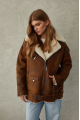 Women's sheepskin coat in a vintage style, made of natural sheepskin in the color of whiskey