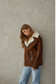 Women's sheepskin coat in a vintage style, made of natural sheepskin in the color of whiskey