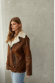 Women's sheepskin coat in a vintage style, made of natural sheepskin in the color of whiskey