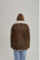 Vintage sheepskin coat of brown color from natural sheepskin