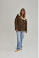 Vintage sheepskin coat of brown color from natural sheepskin