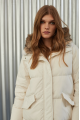 Women's down jacket of white color with a hare fur trim