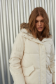 Women's down jacket of white color with a hare fur trim