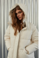 Women's down jacket of white color with a hare fur trim