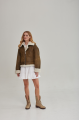 Women's short sheepskin coat made of natural sheepskin in a vintage style in brown color