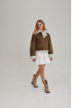 Women's short sheepskin coat made of natural sheepskin in a vintage style in brown color