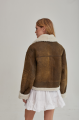 Women's short sheepskin coat made of natural sheepskin in a vintage style in brown color