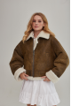 Women's short sheepskin coat made of natural sheepskin in a vintage style in brown color