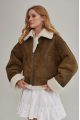 Women's short sheepskin coat made of natural sheepskin in a vintage style in brown color