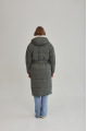 Stylish green women's down jacket with natural filler and sheepskin fur trim