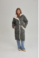 Stylish green women's down jacket with natural filler and sheepskin fur trim