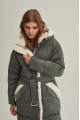 Stylish green women's down jacket with natural filler and sheepskin fur trim