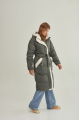 Stylish green women's down jacket with natural filler and sheepskin fur trim