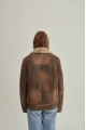 Vintage women's sheepskin coat made of brown natural sheepskin