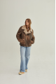 Vintage women's sheepskin coat made of brown natural sheepskin