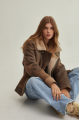 Vintage women's sheepskin coat made of brown natural sheepskin