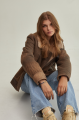 Vintage women's sheepskin coat made of brown natural sheepskin