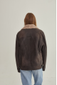 Women's sheepskin coat of gray color in vintage style