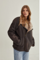 Women's sheepskin coat of gray color in vintage style