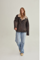 Women's sheepskin coat of gray color in vintage style