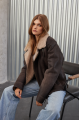 Women's sheepskin coat of gray color in vintage style