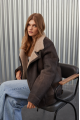 Women's sheepskin coat of gray color in vintage style