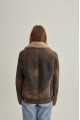 Women's sheepskin coat of brown color in American vintage style