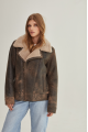 Women's sheepskin coat of brown color in American vintage style