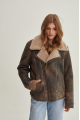 Women's sheepskin coat of brown color in American vintage style