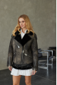 A black sheepskin coat made of natural sheepskin in the VINTAGE style