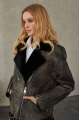 A black sheepskin coat made of natural sheepskin in the VINTAGE style