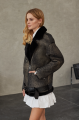 A black sheepskin coat made of natural sheepskin in the VINTAGE style